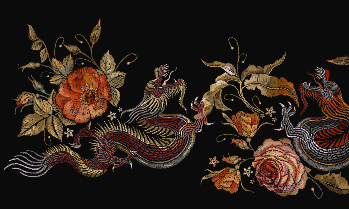 Detailed floral and bird embroidery on a black background