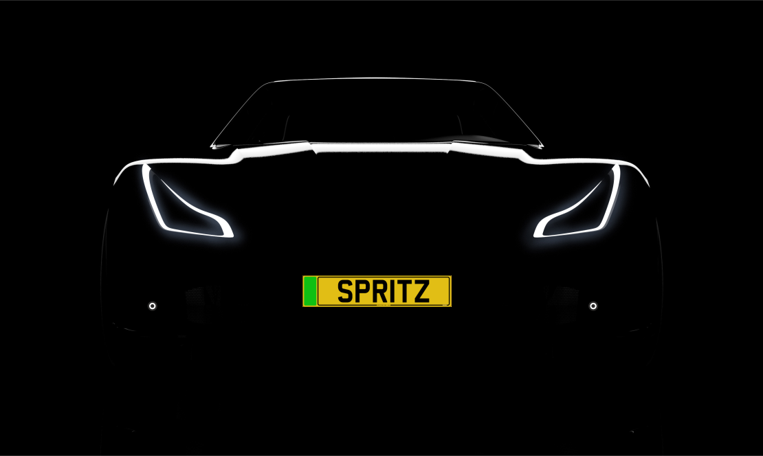 Original SPRITZ show plate illustration on a car